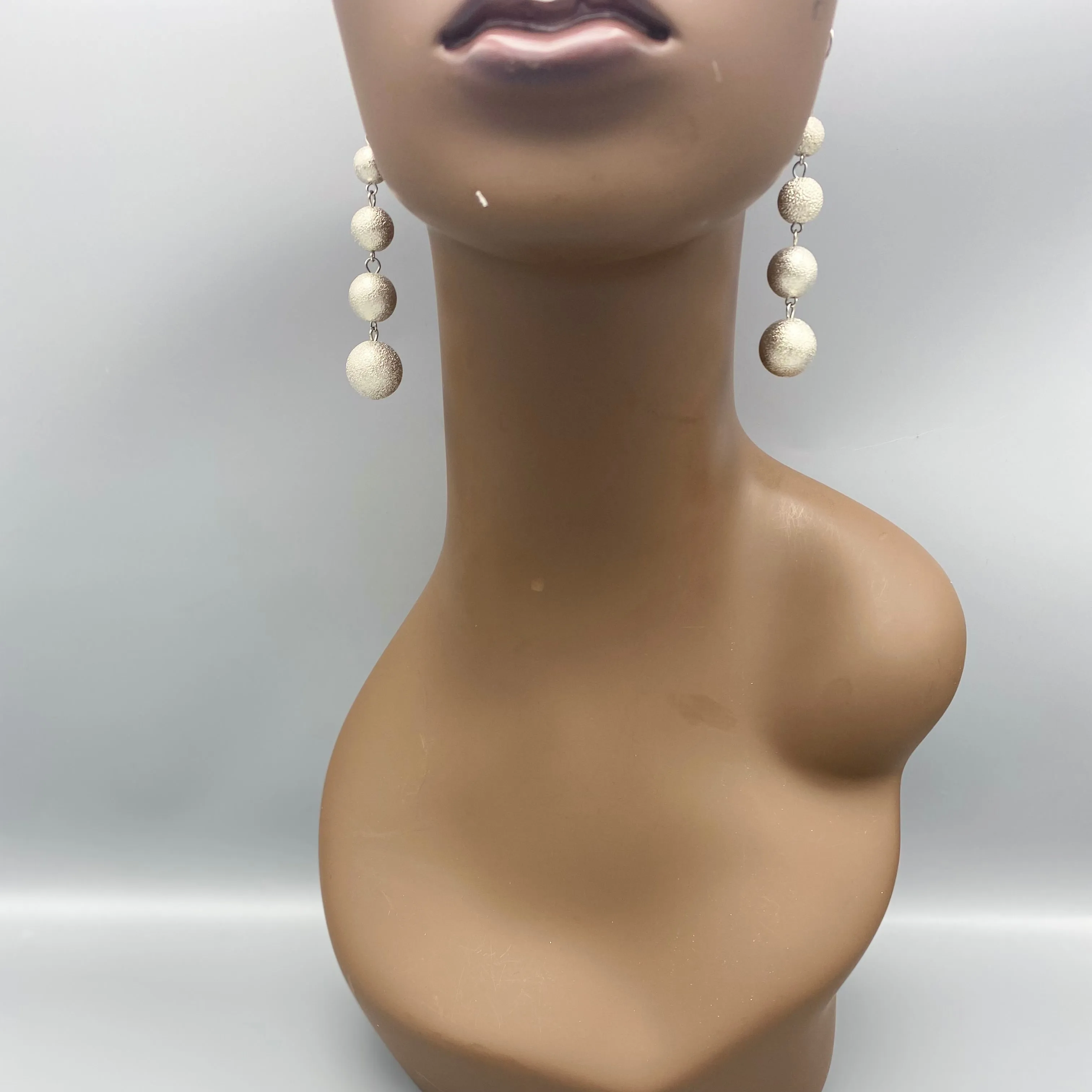 Gaddo Shoulder Duster Earrings